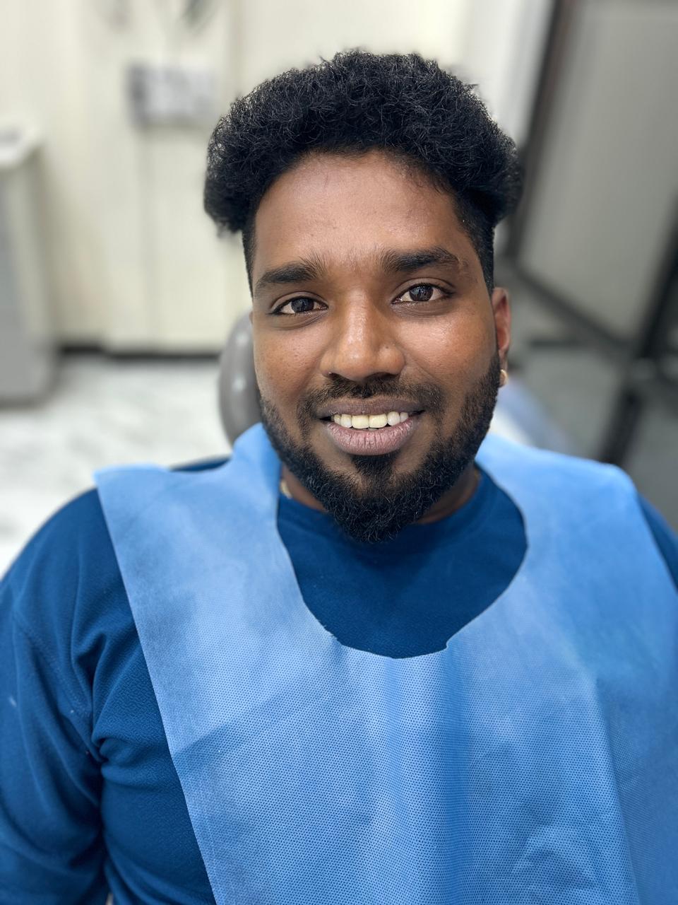 front tooth restored with a natural-looking dental crown